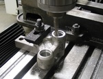 Rocker for lower suspension linkage