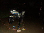 washing the bike, at night, with my girl Rain